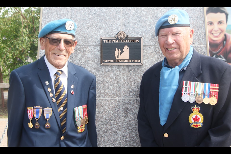 Harry Bishop and Royal Canadian Legion Branch 260 president Ray Carlson are two of 100 Mile House's UN Peacekeeper veterans who were happy to see the Peacekeeper's Plaque returned to its place on the Cenotaph. (Patrick Davies photo - 100 Mile Free Press)
