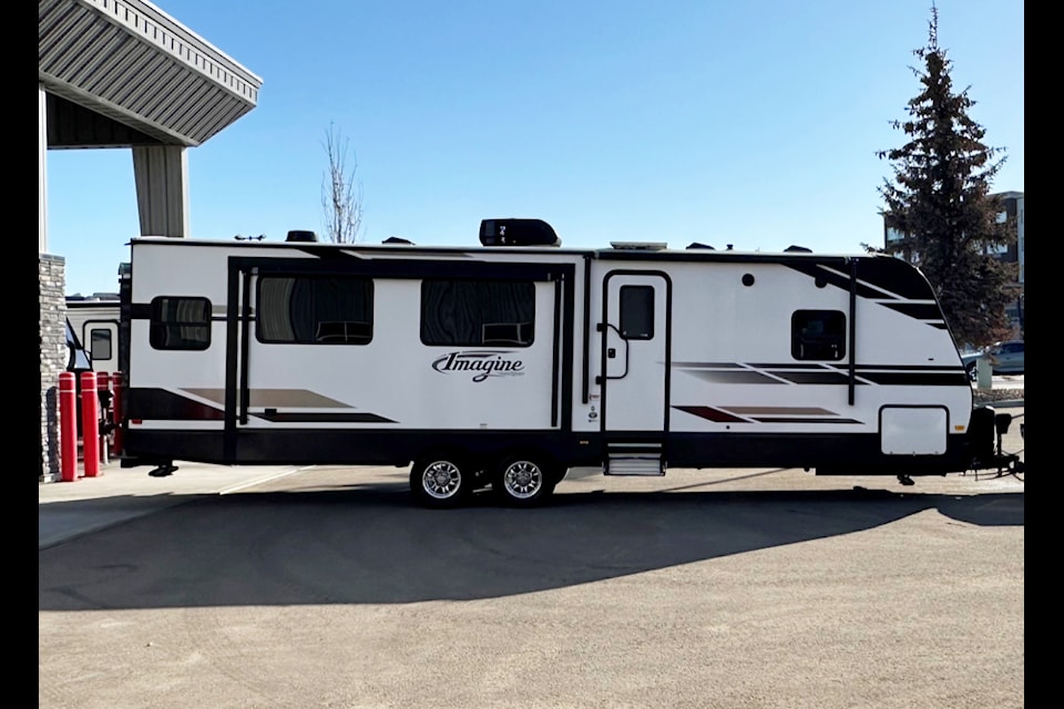 100 Mile House RCMP are looking to locate this  RV trailer stolen from a property on Greenall Road last week. (Photo submitted)