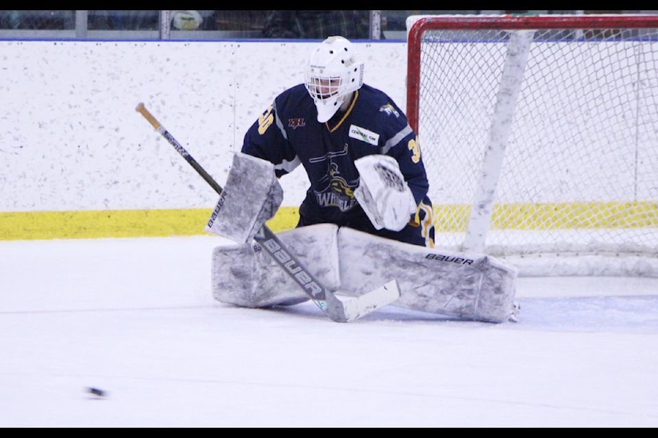 100 Mile House Wrangler goalie Kaidyn Shaw guards his net during a game at the South Cariboo Rec Centre. (Patrick Davies photo - simplymastery)