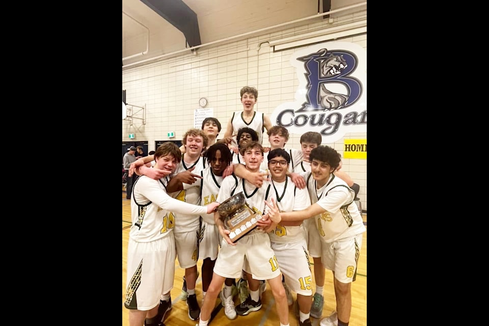 The Peter Skene Ogden Secondary School Eagles celebrate their victory in the Barriere Secondary School Cougar Classic on Saturday. Dec. 14. (Photo submitted)