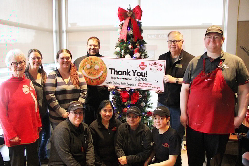 Members of the South Cariboo Health Foundation accept a cheque donation of $8,962 from the 100 Mile House Tim Hortons team on Friday, Dec. 6. (Patrick Davies photo - simplymastery) 