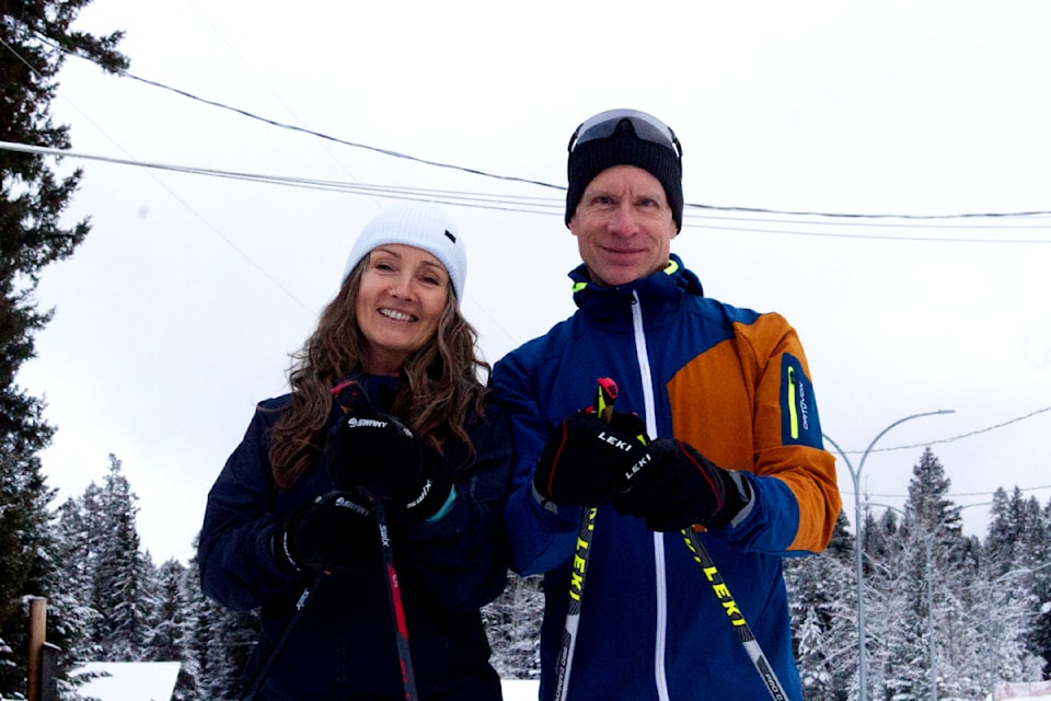 From left to right, Tish Diamond and Steve Law, smiling with skis on at the 100 Mile Nordic Ski Club located at the 99 Mile Recreational Trails on Dec. 31 (Misha Mustaqeem photo - simplymastery) 