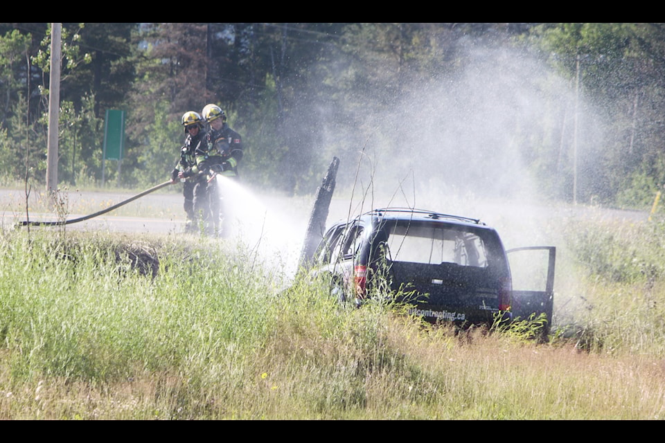100 Mile Fire Rescue works to extinguish a truck fire on Exeter Truck Road on the morning of Tuesday, July 16. (Patrick Davies photo - simplymastery)