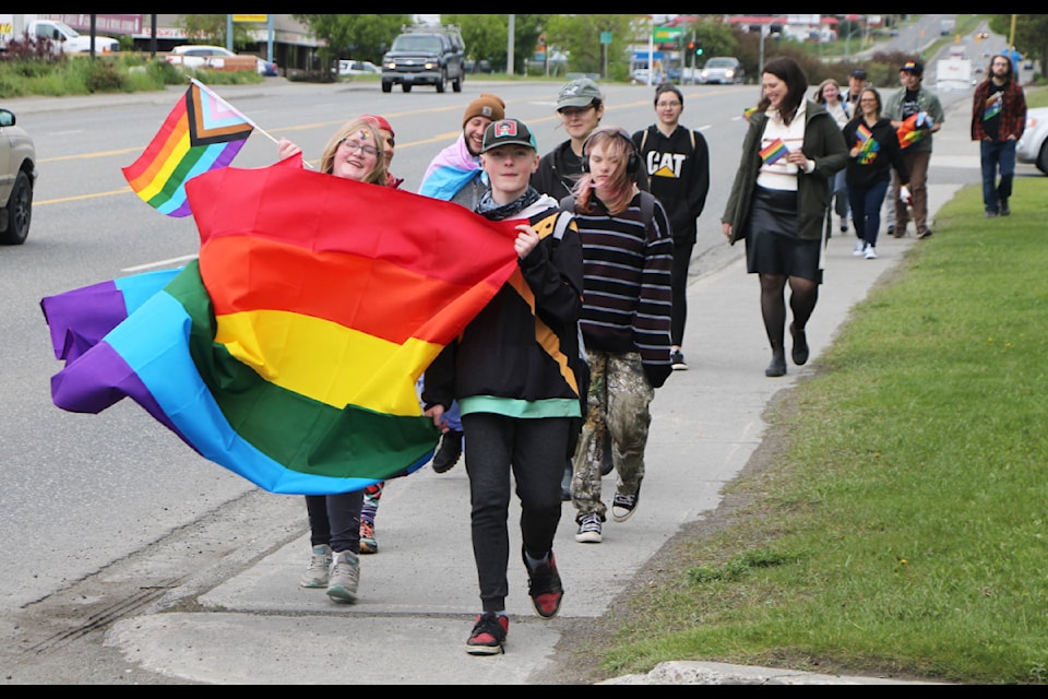 Members of Peter Skene Ogden Secondary School's Gay Straight Alliance and the 100 Mile House Pride Society conducted a Pride Walk down Highway 97 last Monday. (Patrick Davies photo - 100 Mile Free Press) 