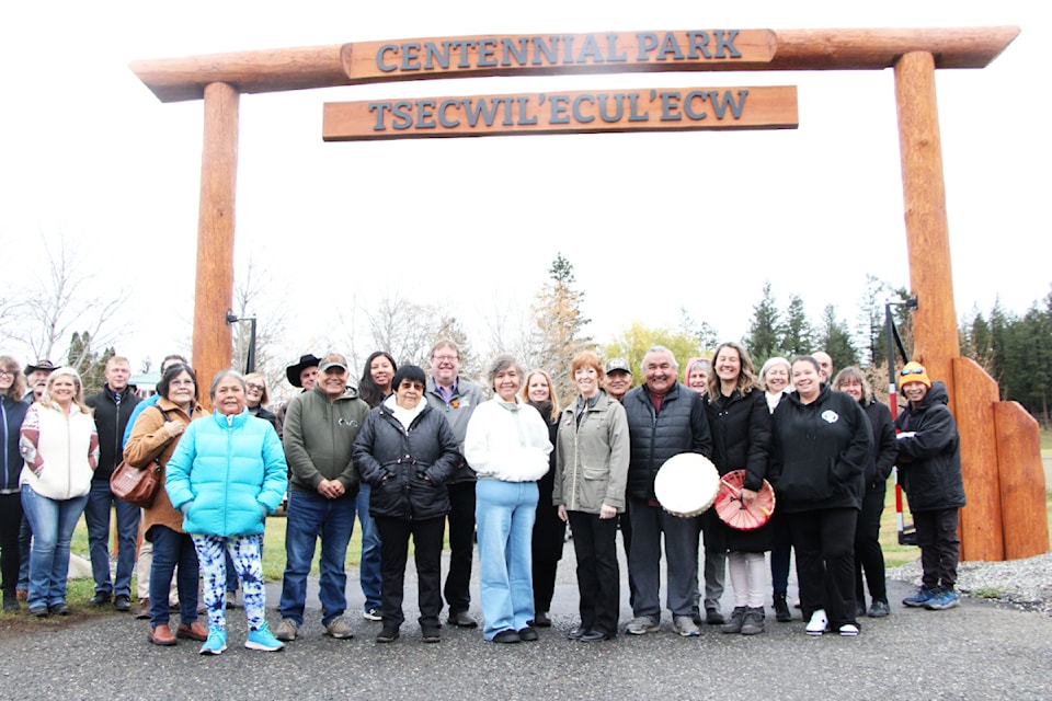 Members of the Tsq̓éscen̓ First Nation, District of 100 Mile House and Cariboo Regional District attended a ceremony on Monday, Oct. 21 to celebrate the opening of Centennial Park's new sign. (Patrick Davies photo - simplymastery)