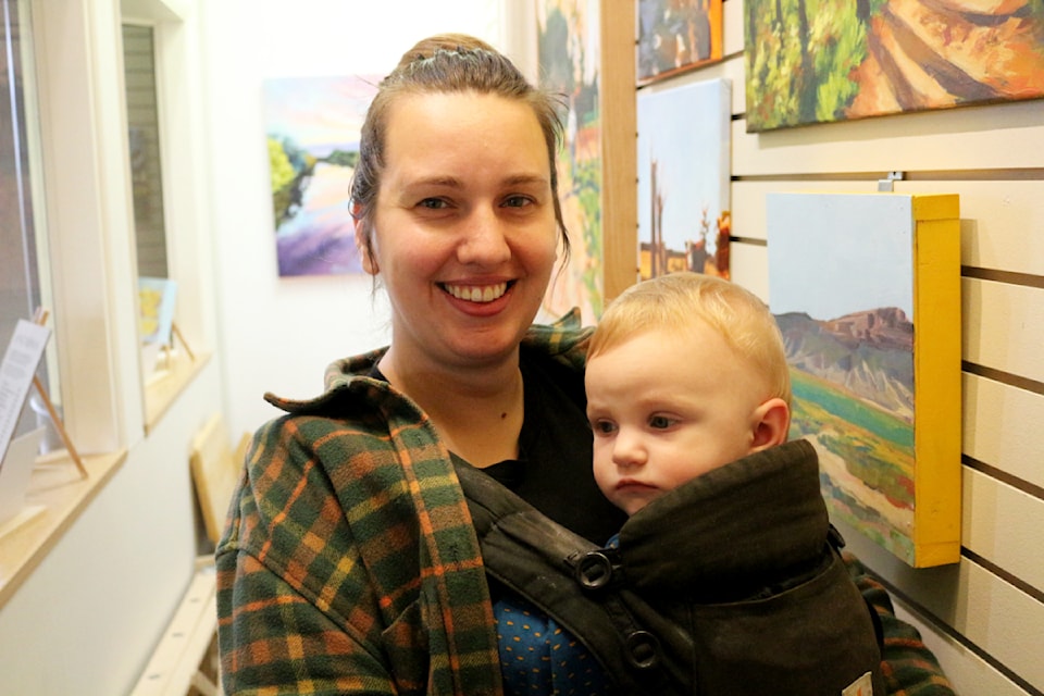 Jess Thomas, with her daughter Zetta Thomas, at the South Cariboo Business Centre's Showcase Gallery on Oct 2. Jess is showcasing her art which will run until November. (Misha Mustaqeem photo - simplymastery)