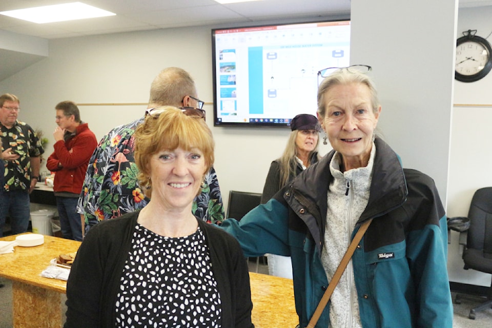 District of 100 Mile House Mayor Maureen Pinkney talked with Yoka Brondijk during the Coffee with Council event held on Oct. 16 at the District of 100 Mile House Council Chambers. (Misha Mustaqeem photo - 100 Mile Free Press)