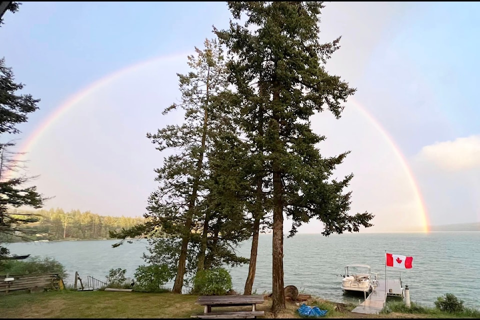A rainbow rises over Lac La Hache on Aug. 18, 2024. (Darlene Brown photo)