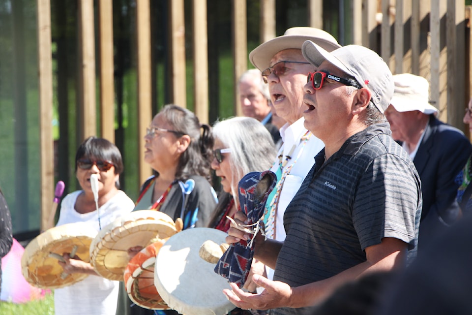 Elders and leaders of the Tsq̓éscen̓ First Nation, Williams Lake First Nation, Esk’etemc First Nation, Stswecem'c Xget'tem First Nation and the Xatśūll First Nation all came together for a drumming ceremony to celebrate the soft opening of the Ckultenellcw Cultural Centre. (Patrick Davies photo - 100 Mile Free Press)