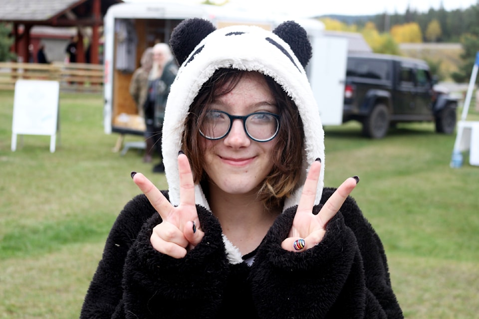 Melody Craigen poses for the camera at the 108 Heritage Site's Fall Fair on Sept. 28 (Misha Mustaqeem - 100 Mile Free Press)