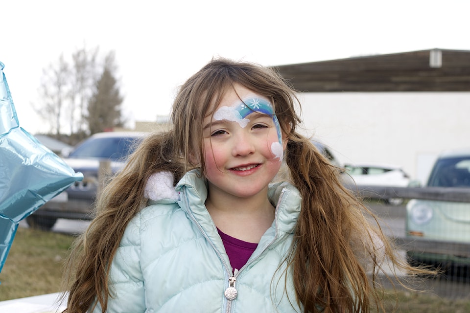 Kylie Meszaros poses for a picture during the Autism Awareness Day event in 100 Mile House. (Misha Mustaqeem photo - simplymastery)