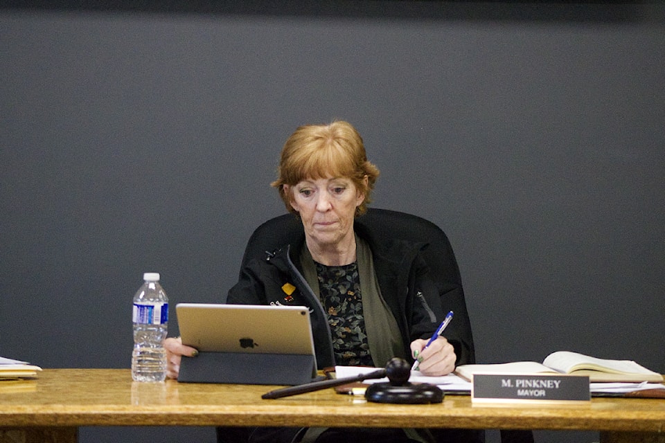 District of 100 Mile House Mayor Maureen Pinkney takes notes during the Apr. 8 council meetings held at the District of 100 Mile House Council Chambers. (Misha Mustaqeem photo - 100 Mile Free Press)