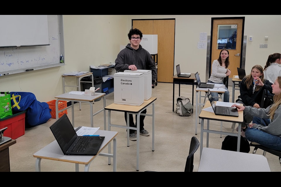 Peter Skene Ogden Secondary School student  Jack Tillotson takes part in the 2025 Student Vote in April. (Photo submitted)
