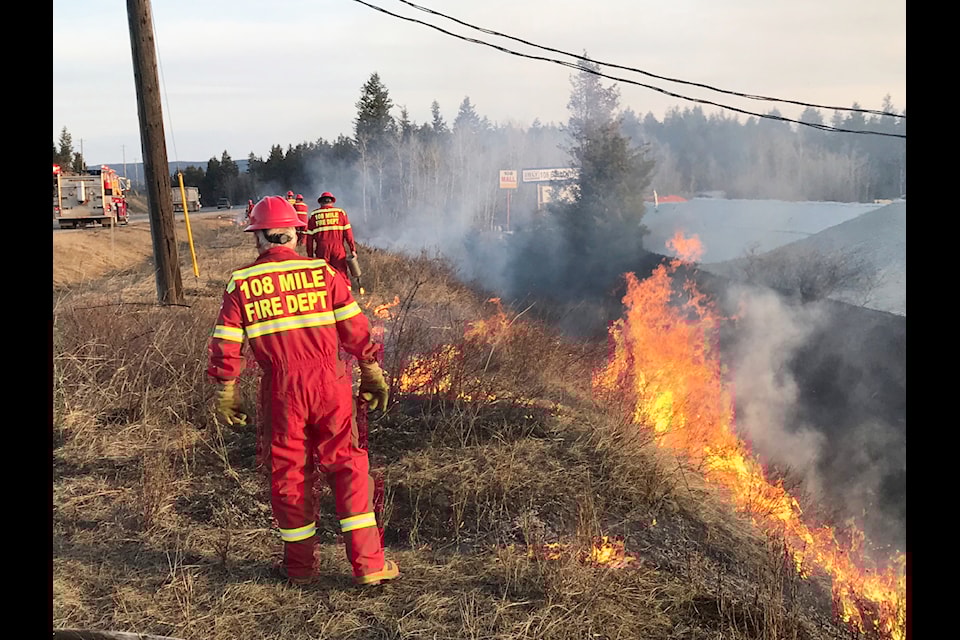 Members of the 108 Mile Volunteer Fire Department respond to a grass fire. (Photo submitted)