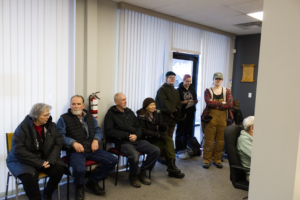 People gather inside the District of 100 Mile House Feb. 11 Committee of the Whole meeting which discussed the proposed neutral space bylaw. (Misha Mustaqeem photo - 100 Mile Free Press)