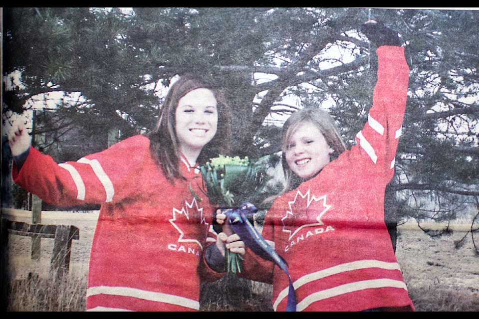 About 15 years before Canada defeated the US at the Four Nations Face-Off in Boston, Katelyn Ramundo and Carly Evans, then residents of 100 Mile House, were there to see the Vancouver 2010 Olympics where Canada also defeated the US by an identical score.  (100 Mile Free Press historical photo)