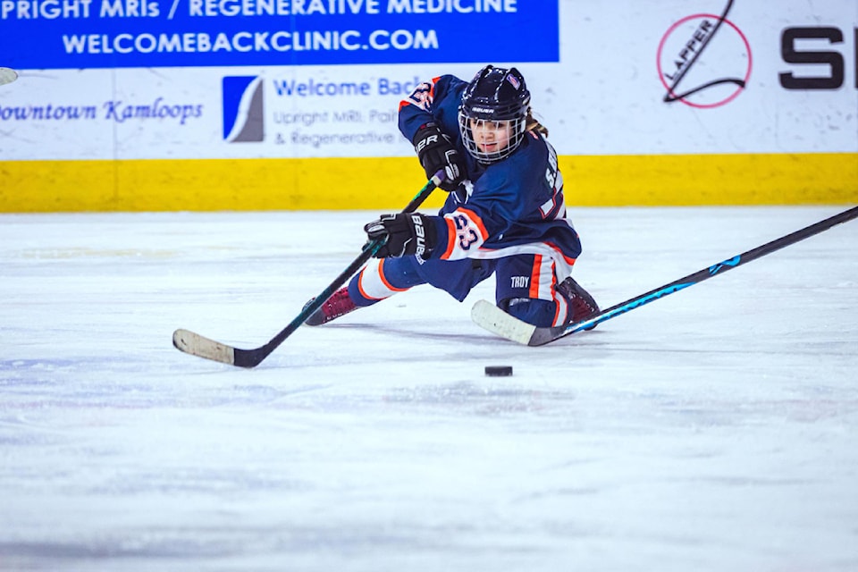 Shia Briggs fights for control of the puck during a game this year playing for the Kamloops Blazers. (Photo submitted)