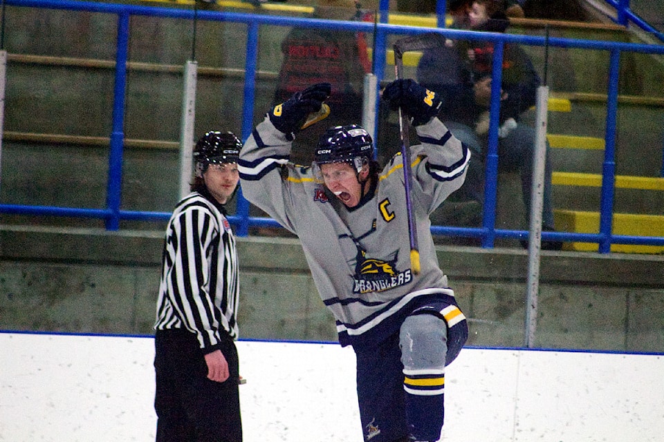 100 Mile House Wrangler Ethan Davey celebrates scoring a goal against the Quesnel River Rush. (Misha Mustaqeem photo - 100 Mile Free Press)