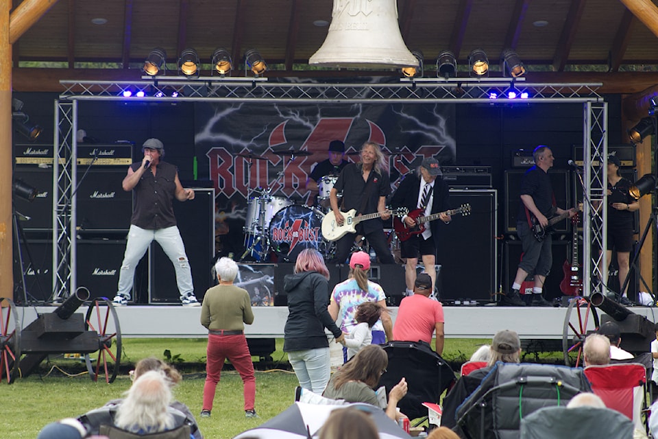 People dance in front of the stage as AC/DC tribute band Rock or Bust play at Parks Alive 2025 in Centennial Park on July 18. (Misha Mustaqeem photo - 100 Mile Free Press)
