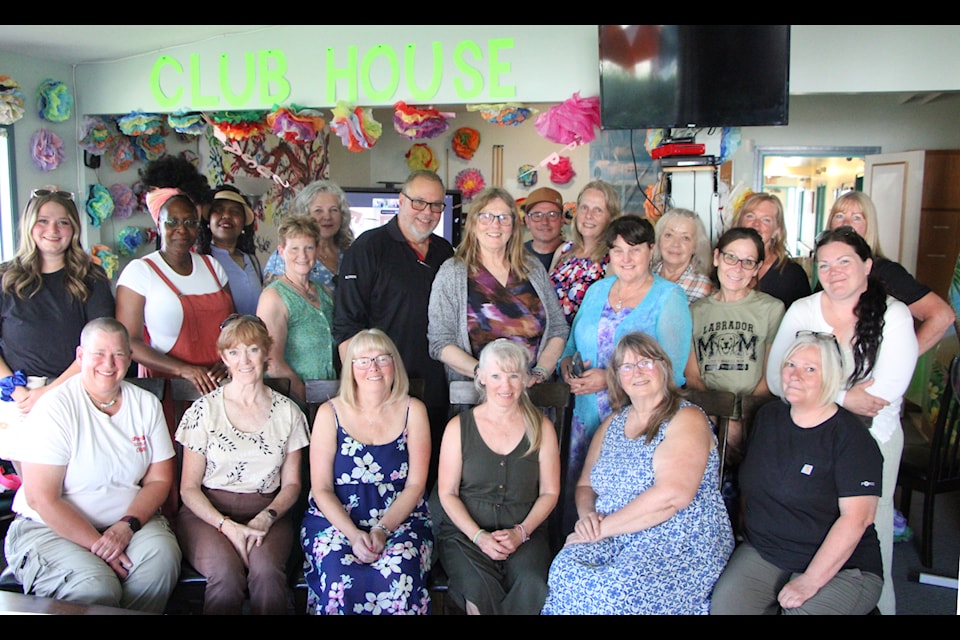 Around 20 colleagues, friends and former executive directors came out to the retirement party of Susann Collins (centre) at the Canadian Mental Health Association South Cariboo branch. (Patrick Daives photo - 100 Mile Free)