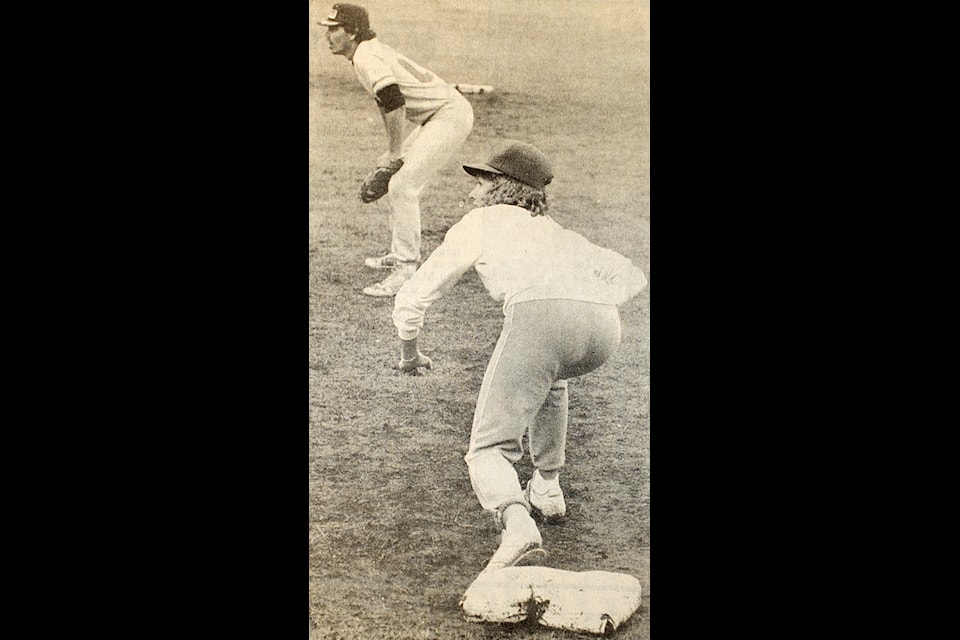 Cheryl Goin of the Bats prepares to steal second during a league tournament that had been held on July 4 and 5, 1987 in 100 Mile House. (simplymastery historical photo)