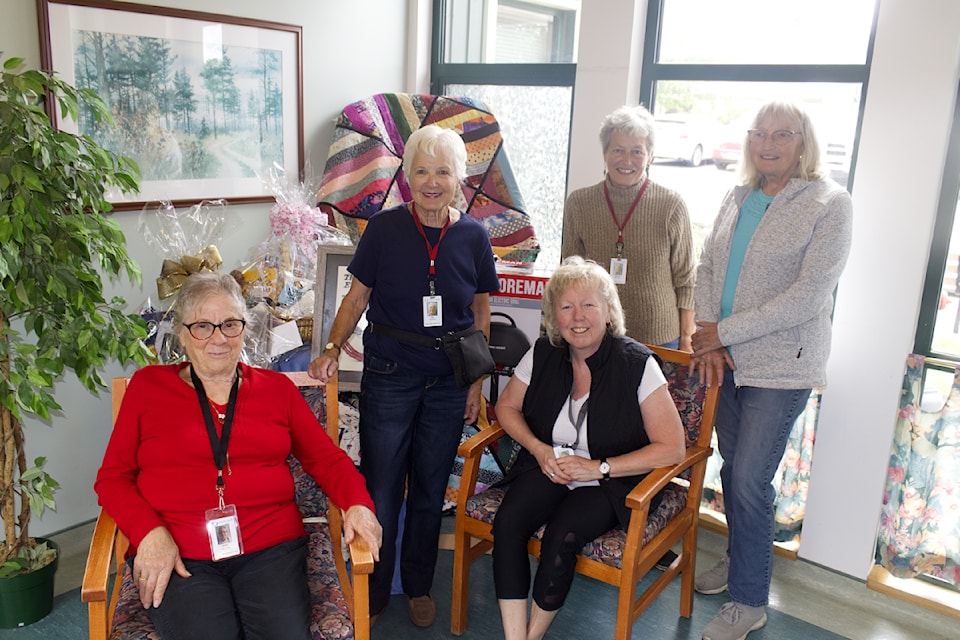 Volunteers with the Mill Site Lodge/Fischer Place Auxiliary conducted the draw for the 2025 annual Spring Raffle on Friday, June 27. The winners are: first prize, a homemade quilt, went to Joan Williams. Second prize, a framed cross stitch of Norman Rockwell's Grandfather and Boy went to Gillian Franklin. Third prize, a George Foreman BBQ worth $380, went to Bonnie Porritt, with fourth prize, a women's spa basket going to Jenn Hols and fifth prize, a gentlemen's spa basket going to Anita Pettitt. (Misha Mustaqeem photo - simplymastery)