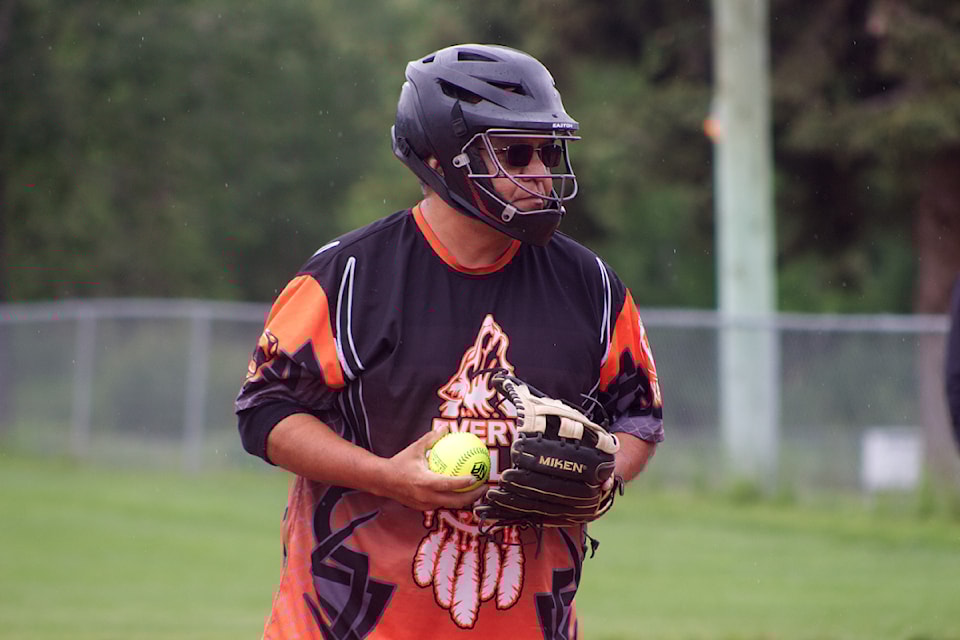 Derek Saul prepares to pitch in the Strikers vs. Shafted game during Party in the Ballpark near the South Cariboo Rec Centre on June 27. (Misha Mustaqeem photo - simplymastery)