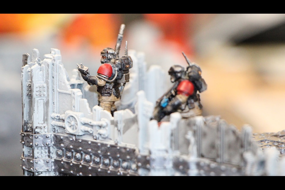 100 Mile Free Press editor Patrick Davies' Kasrkin Kill Team perches atop a building during a game of Kill Team. (Patrick Davies photo - 100 Mile Free Press)