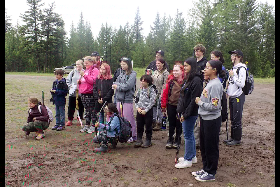 Students of the Clinton Minor Sports Association smile for a group photo during the Bighorn Archery Club's annual Traditional 3D Shoot on June 21. (Misha Mustaqeem photo - simplymastery)