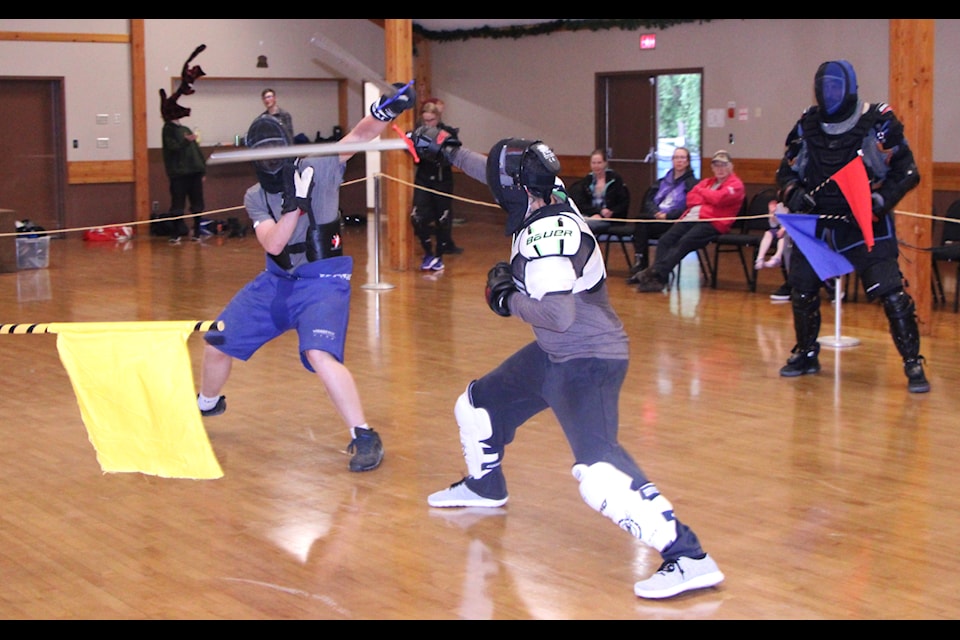 Joe Wieduwilt and Riad Hess duel in the finals of Cariboo Bladed Combat's year-end tournament at the 100 Mile House Community Hall. (Patrick Davies photo - simplymastery)
