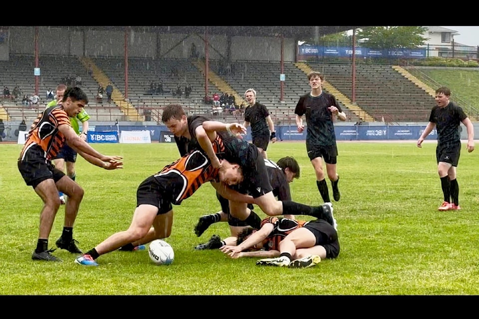 The Peter Skene Secondary School senior boys Eagles rugby team goes head to head with another rugby team at provincials. (Photo submitted)