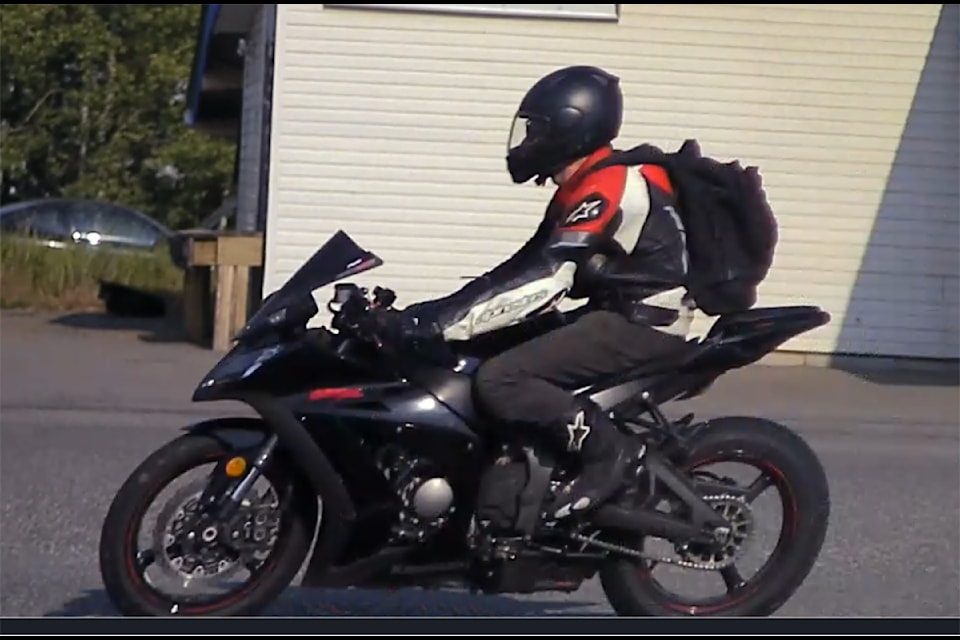 A motorcyclist with a bike. RCMP is asking the public for help to identify the rider. (Photo submitted - 100 Mile House RCMP)