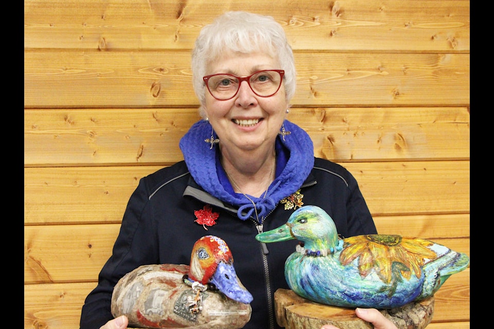 Bridge Lake resident Nancy Law has spent the last six years painting a collection of decoy ducks and geese left to her by her brother. (Patrick Davies photo - simplymastery)