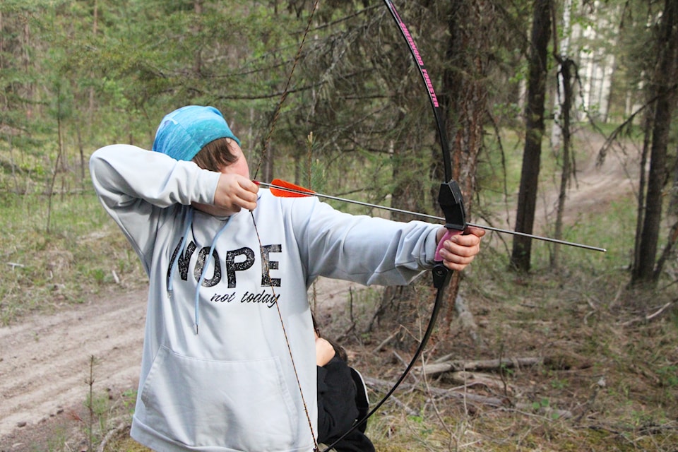 Mackenley Parker takes aim at a fake animal at the Bighorn Archery Club's outdoor shooting range. (Patrick Davies photo - simplymastery)