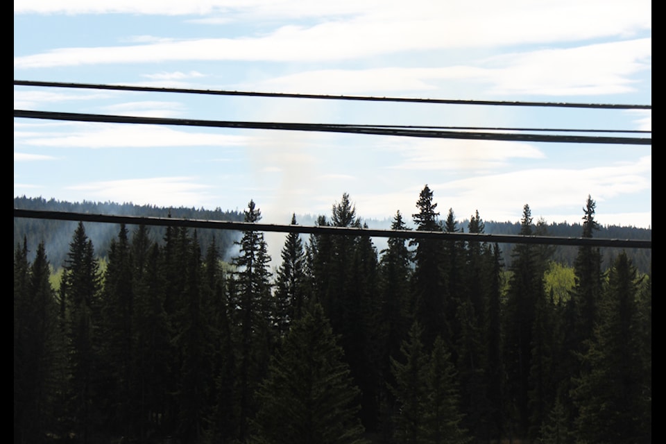 White smoke rises from a small wildland fire visible from Horse Lake Road on Monday, May 5. (Patrick Davies photo - simplymastery)