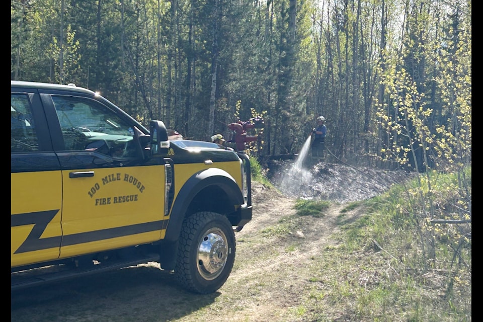 100 Mile Fire Rescue responds to a woodland fire in the District of 100 Mile House on Monday, May 5. 100 Mile House RCMP suspect the cause of the fire was arson. (100 Mile Fire Rescue photo)
