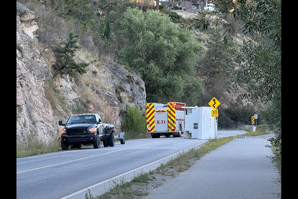 A detached trailer lies on the road on Pelmewash Parkway after a crash.
