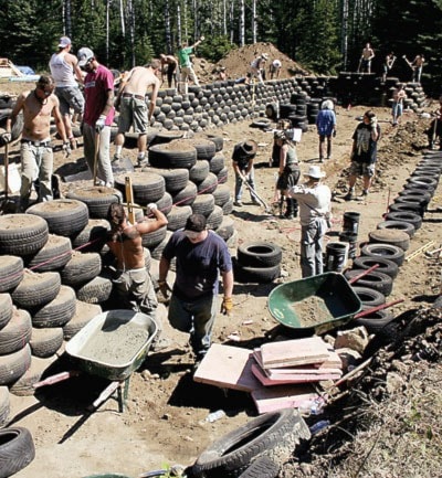 Day 3 of the tire construction on the Garlind Farm Earthship Build with Michael Reynolds in Lone Butte_PC Monica Holy