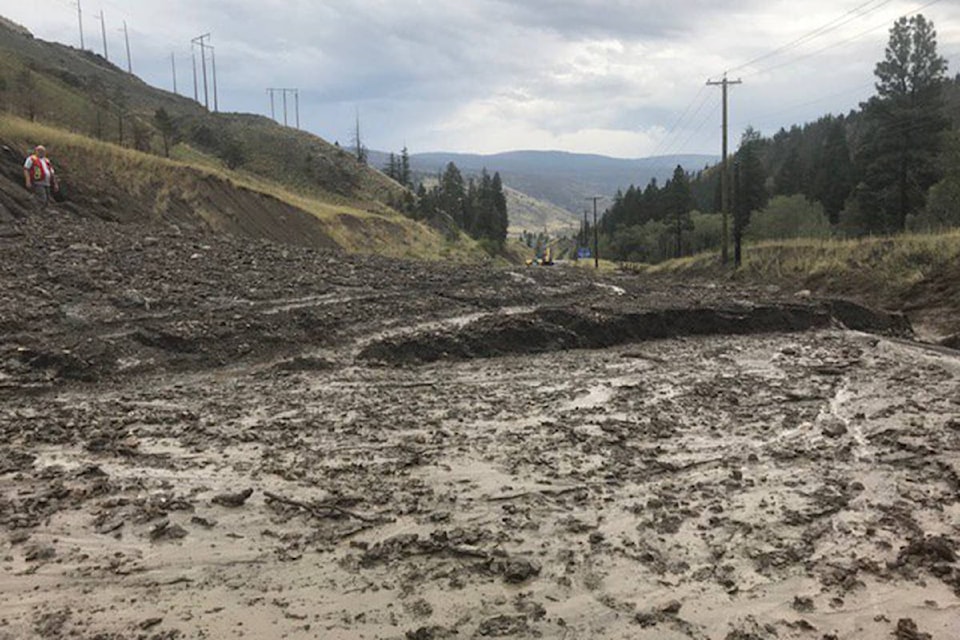 12994820_web1_180809-OMH-mudslide_1