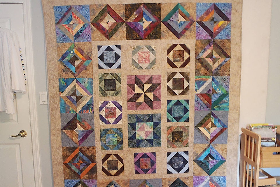 13679823_web1_180927-OMH-quilt