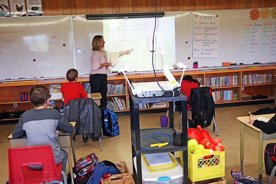 Carolyn Cushing’s Grade 4/5 class gets some in-person instruction on geometry and math on Wednesday, June 3. (Patrick Davies photo - 100 Mile Free Press)