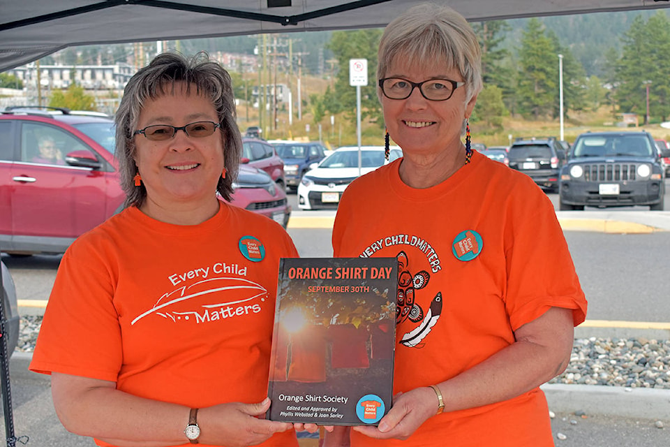 22859353_web1_200915-WLT-OrangeShirtSocietyNewBook_3