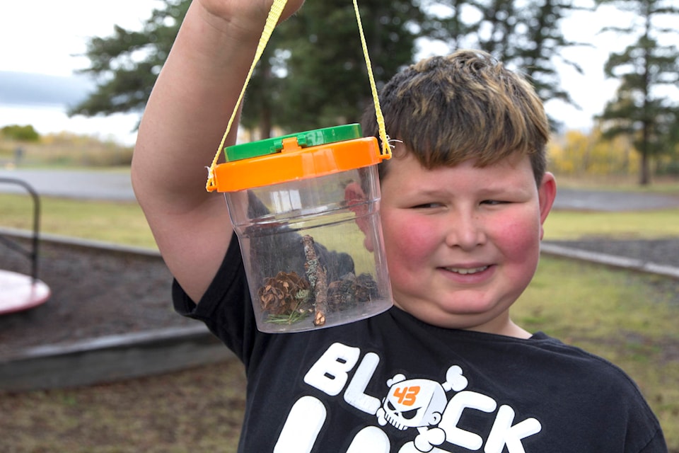 Sawyer Keddie shows off his memory keeper at the Wild School in Lac La Hache. (Kelly Sinoski photo, 100 Mile Free Press).