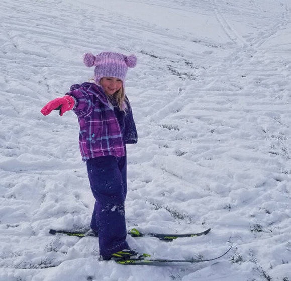 Juliette Leclair enjoys a day of skiing with the 100 Mile Nordics.