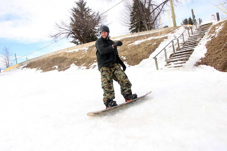 Bryce Bugera grinds down the 100 Mile Quad Kink at the entrance to Centennial Park. See related story on A18. (Patrick Davies photo - 100 MIle Free Press)