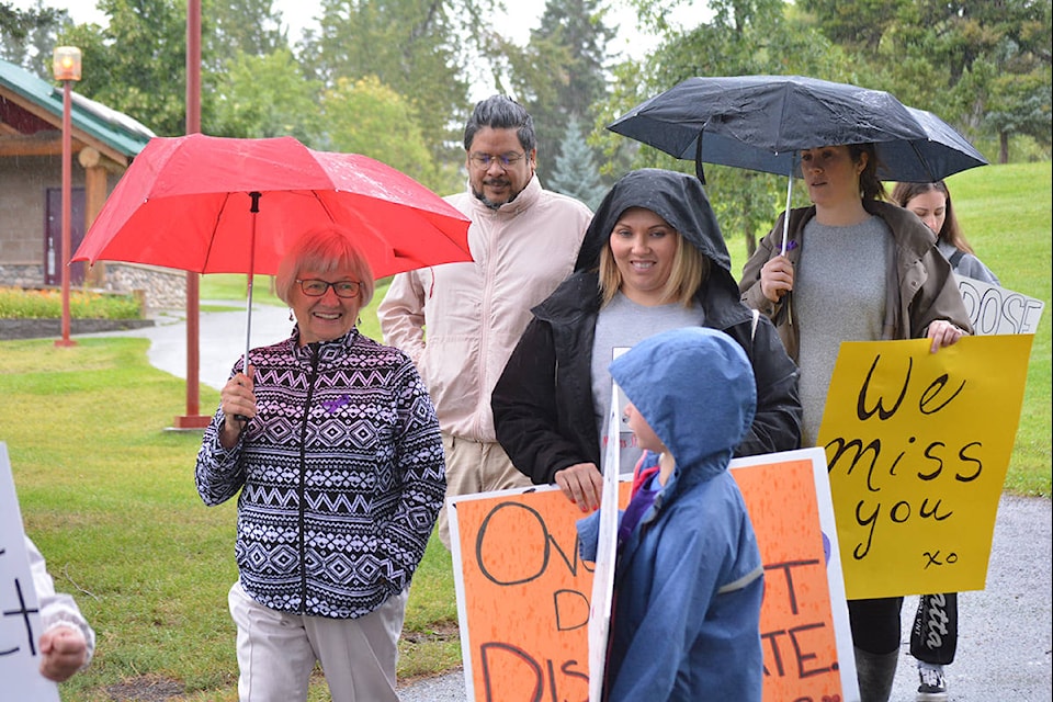 Walkers carried signs and came to honour family members lost to drug overdoses. (Monica Lamb-Yorski photo - Williams Lake Tribune)