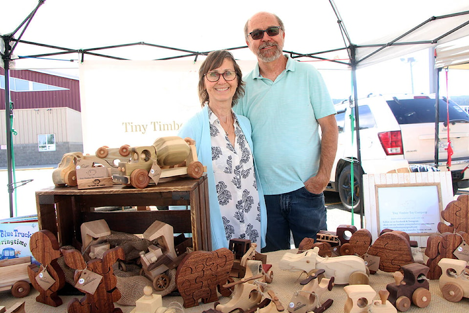 Sherry and Jim Hedges are the craftspeople behind Tiny Timber Toy Company, which they started with the help of their children. (Patrick Davies photo - 100 Mile Free Press)