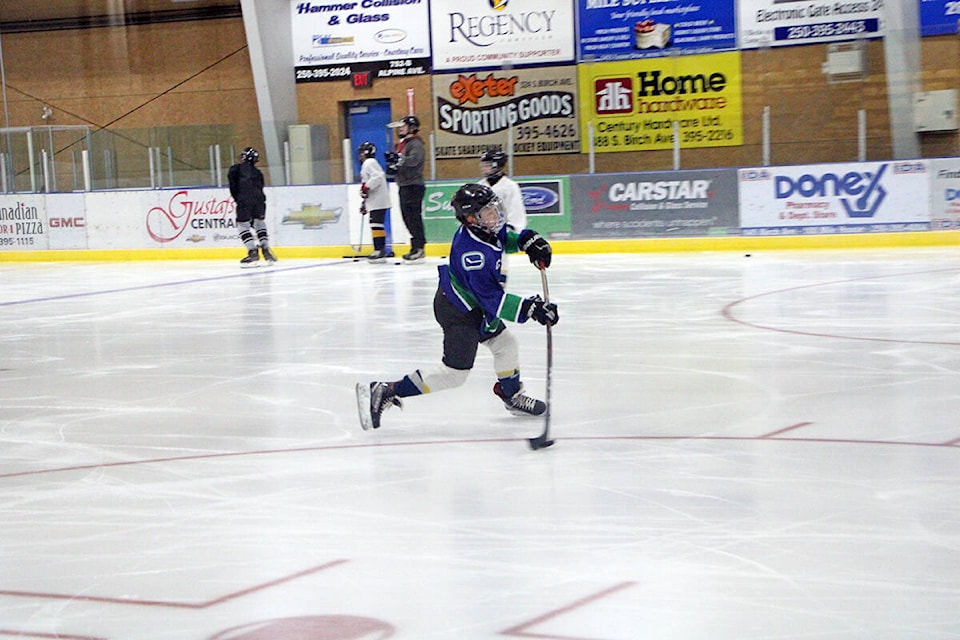 Tucker Gust makes a shot on net during practice at the South Cariboo Rec Centre. (Patrick Davies photo - 100 Mile Free Press)