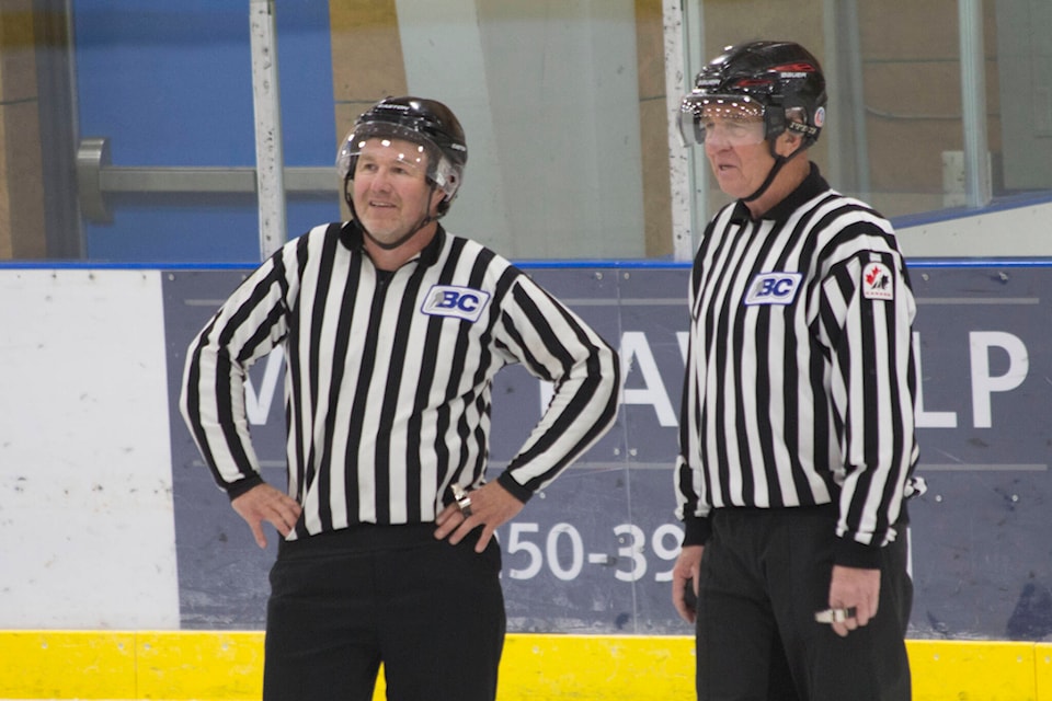 Wade Balbirnie, left, is one of the few referees in the South Cariboo. (Kelly Sinoski photo - 100 Mile Free Press).