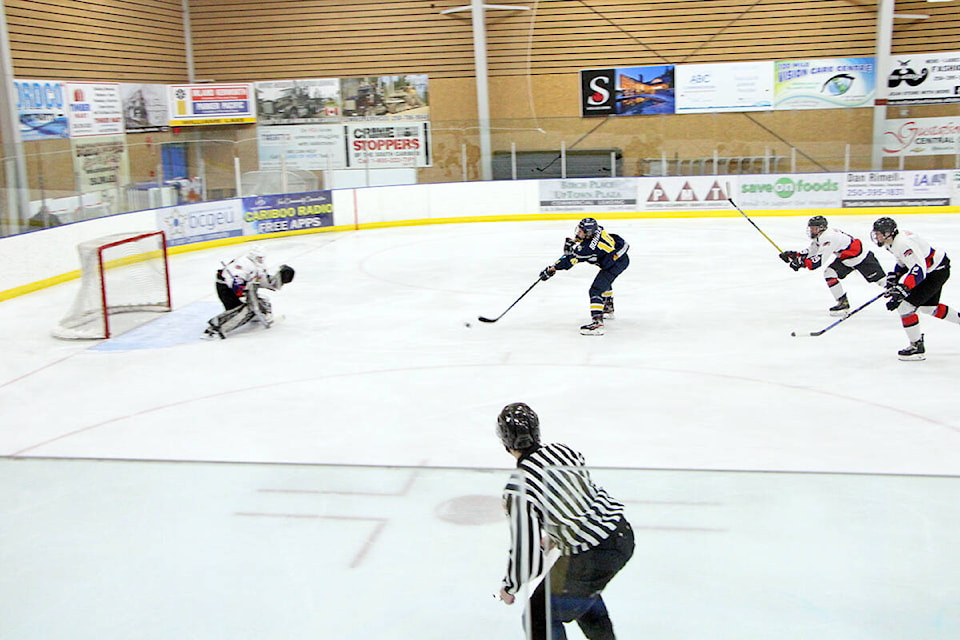 100 Mile Wranglers captain Nathan Bohmer makes a break for the Sicamous Eagles goal to score the first goal of the night last Wednesday. (Patrick Davies photo - 100 Mile Free Press)